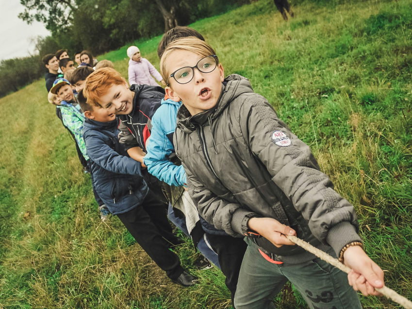 Children playing tug-of-war