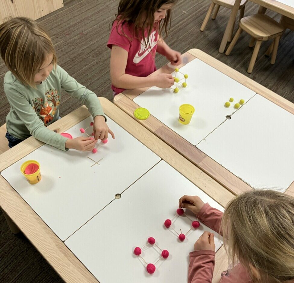 students playing at table