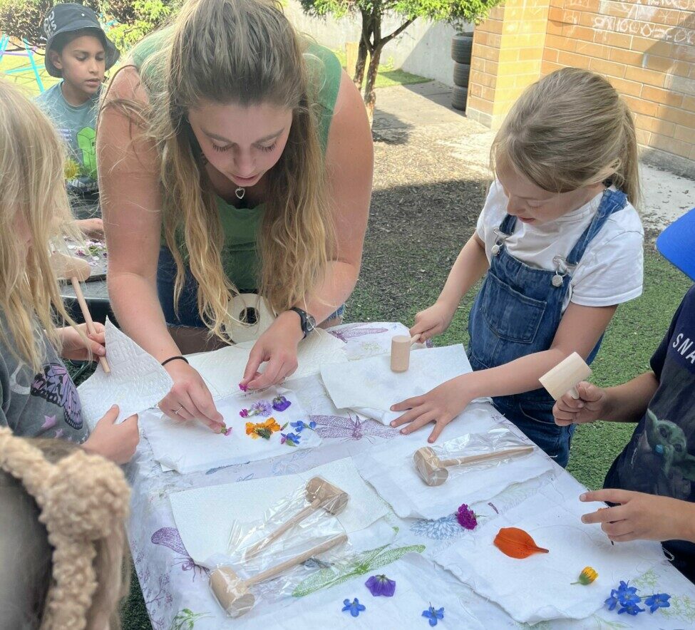 teacher and student at table